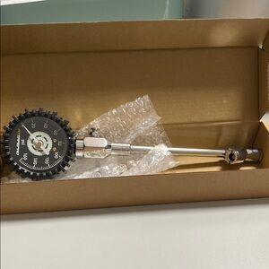 Black and Silver Tire Pressure Gauge